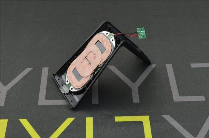 A display of branded wireless chargers from Anker, Belkin, and Choetech