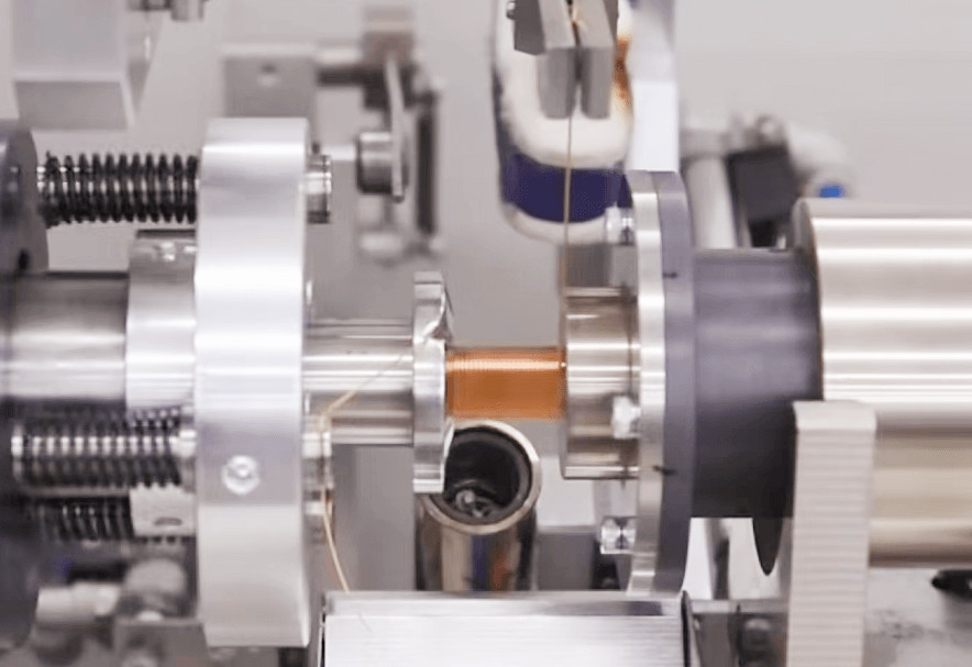 Coil winding machine in action