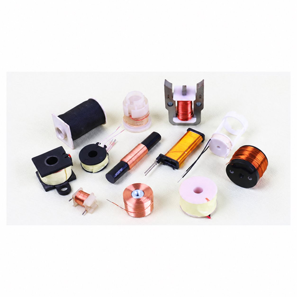 Bobbin-wound coil examples with different supports and connections